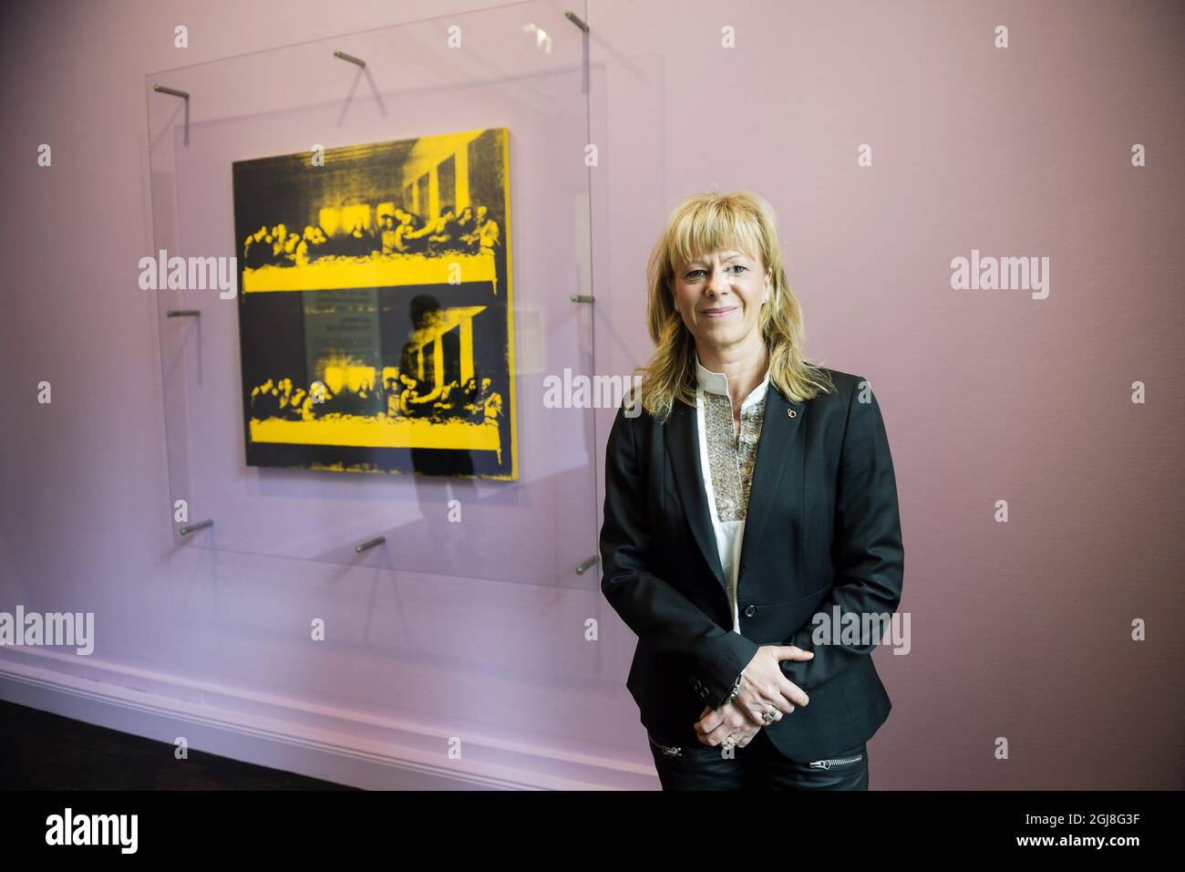 20140507 STOCKHOLM Anna-Karin Pusic, Kuratorin am schwedischen Auktionshaus Bukowskis, spricht über Andy Warhols "das letzte Abendmahl", das jetzt verkauft wird. Das Kunstwerk hat einen Startpreis von 60-80 Millionen schwedischen Kronen oder 664 000 bis 885 000 Euro, was zum teuersten Kunstverkauf in Schweden aller Zeiten werden könnte. Foto: Vilhelm Stokstad / TT / Kod 11370 Stockfoto