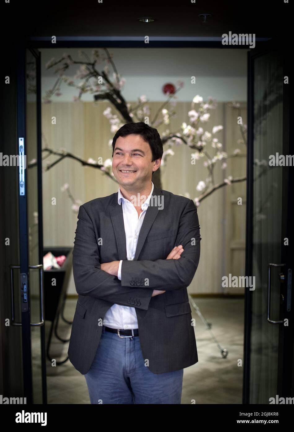 STOCKHOLM 20140630 der französische Ökonom und Autor Thomas Piketty bei einer Pressekonferenz auf dem Flughafen Arlanda vor seinem Besuch der politischen Woche in Almedalen auf der Insel Gotland, Schweden. Foto: Pontus Lundahl / TT / kod 10050 Stockfoto