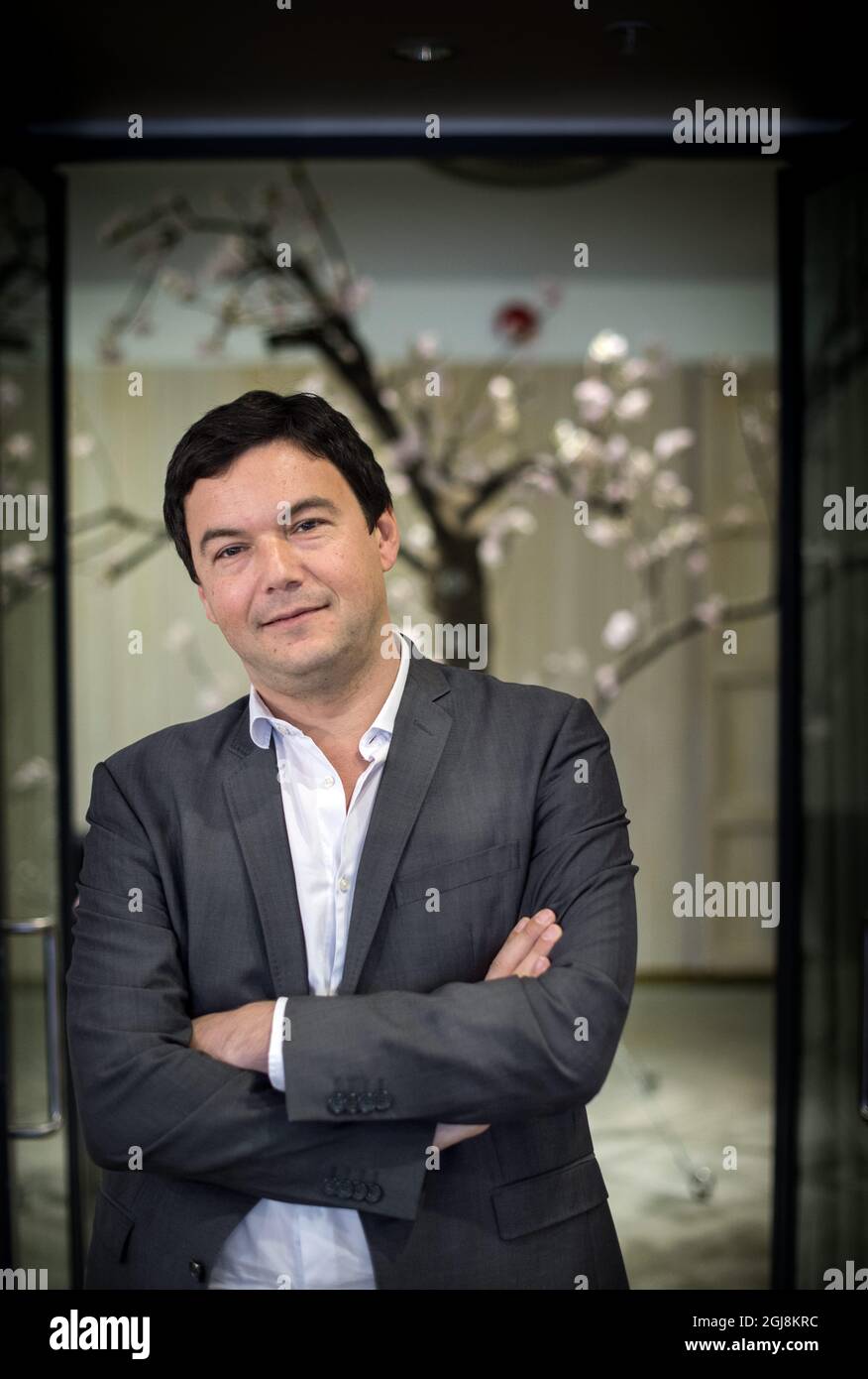 STOCKHOLM 20140630 der französische Ökonom und Autor Thomas Piketty bei einer Pressekonferenz auf dem Flughafen Arlanda vor seinem Besuch der politischen Woche in Almedalen auf der Insel Gotland, Schweden. Foto: Pontus Lundahl / TT / kod 10050 Stockfoto
