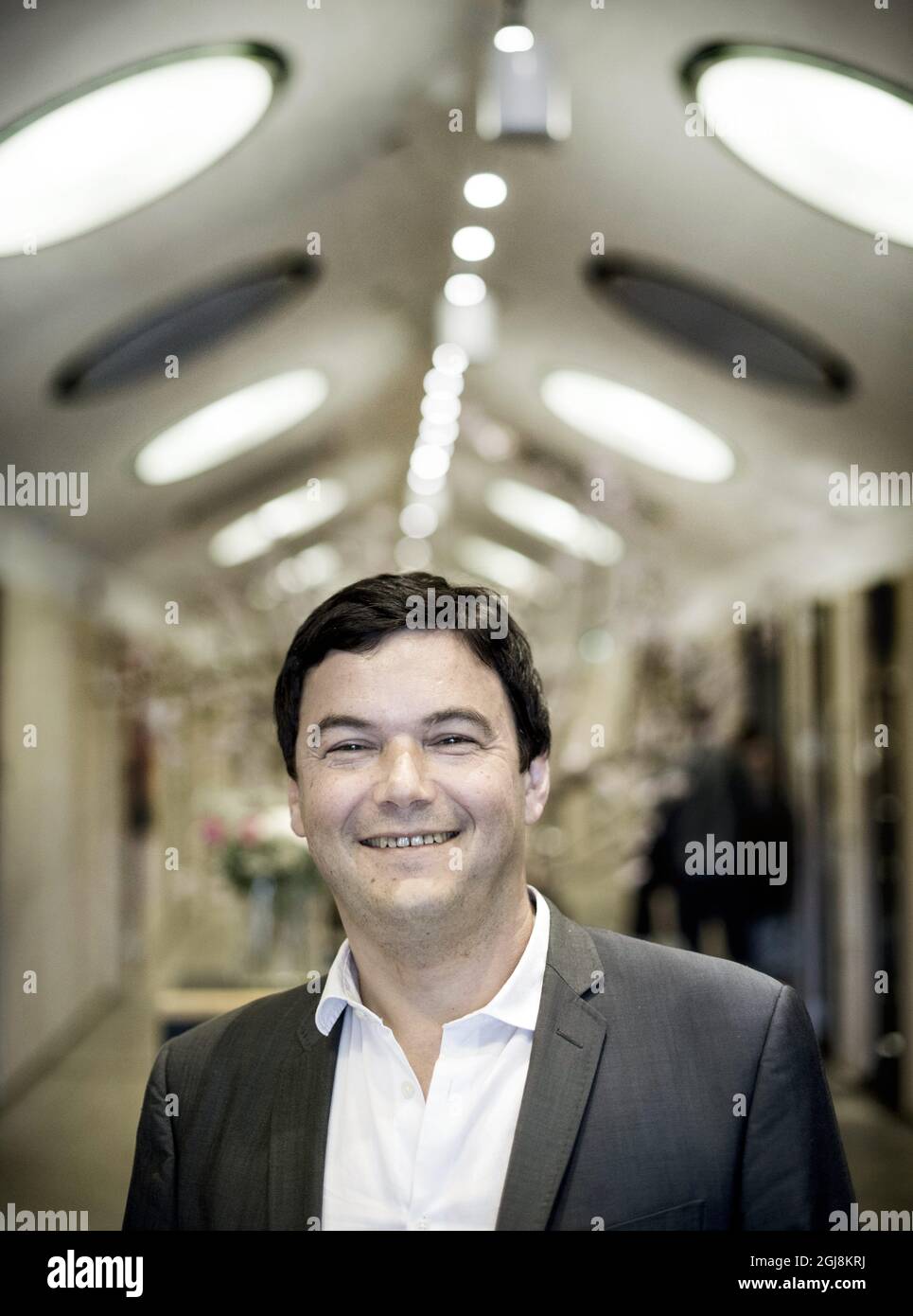 STOCKHOLM 20140630 der französische Ökonom und Autor Thomas Piketty bei einer Pressekonferenz auf dem Flughafen Arlanda vor seinem Besuch der politischen Woche in Almedalen auf der Insel Gotland, Schweden. Foto: Pontus Lundahl / TT / kod 10050 Stockfoto