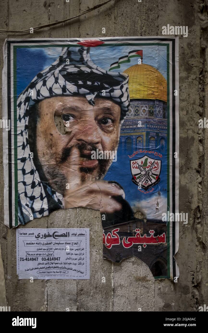 BEIRUT 2016-03-15 das seit 1949 bestehende Shatila-Flüchtlingslager für Palästinenser in Beirut. Plakat mit späterer PLO-Führerin Yasser Arafat Foto: Magnus Hjalmarson Neideman / SVD / TT / Kod 10078 Roller, Straße Stockfoto