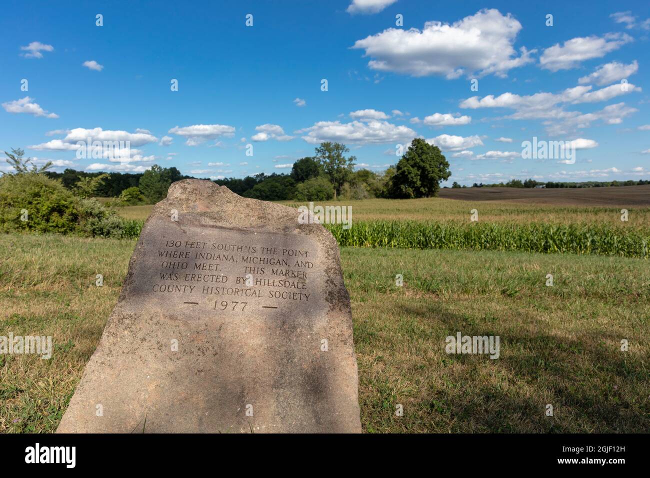 Tri-State-Markierung, die angibt, wo sich die Staaten Ohio, Michigan und Indiana treffen Stockfoto