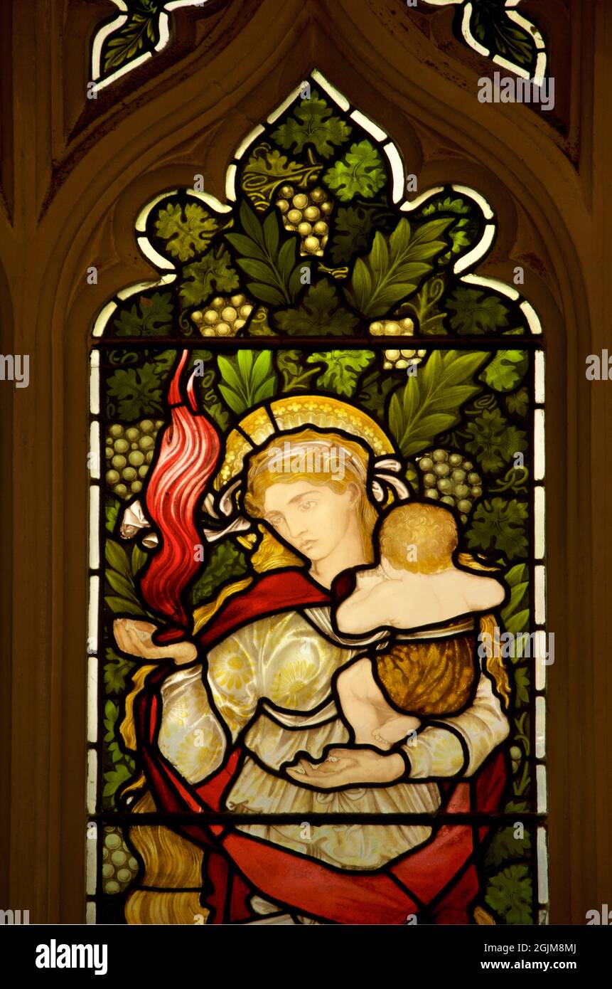 Glasmalerei im Cathedral of Christ Church College, University of Oxford. Detail der CARITAS = Charity Glasmalerei Stockfoto