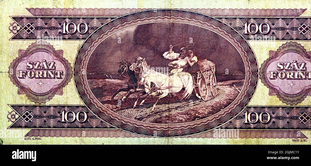 Auf der Rückseite der 100-1-Forint-Banknote 1984 von der Magyar-Bank steht eine Pferdekutsche aus einem Gemälde, die Zuflucht vom Sturm durch Lot genommen hat Stockfoto