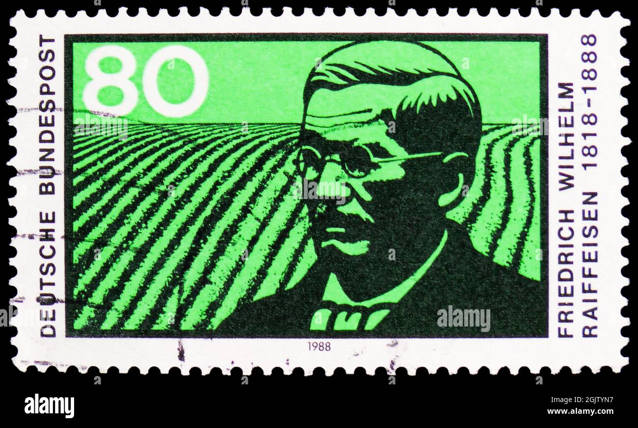 MOSKAU, RUSSLAND - 20. JUNI 2021: In Deutschland gedruckte Briefmarke zeigt Raiffeisen und Pflügefeld, um 1988 Stockfoto