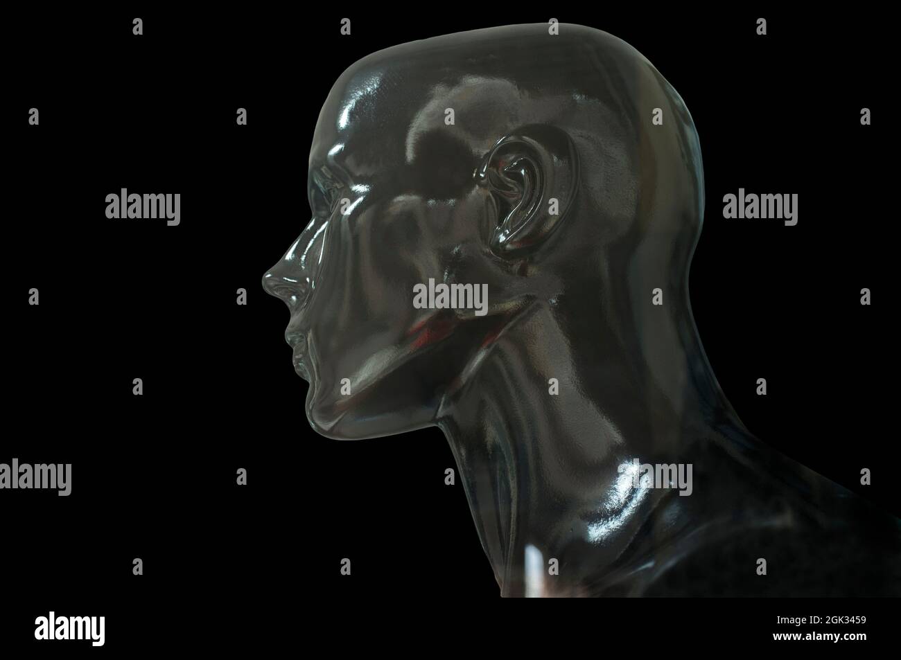 Schwarze Schaufensterpuppe Büste Profil. Isoliert auf schwarzem Hintergrund Stockfoto