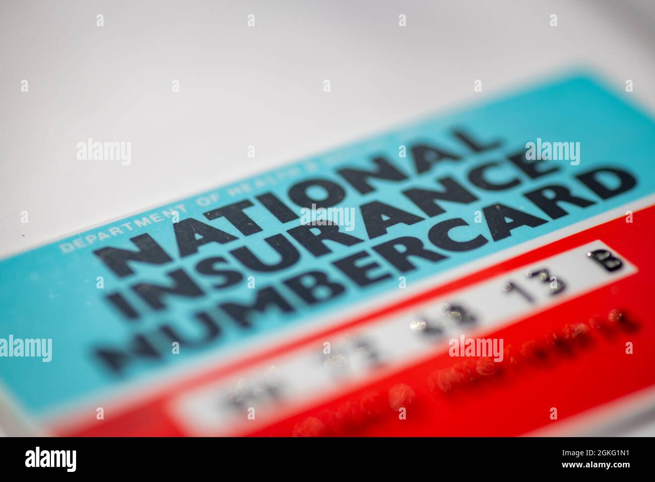 Nahaufnahme einer National Insurance NumberCard des Vereinigten Königreichs. Stockfoto
