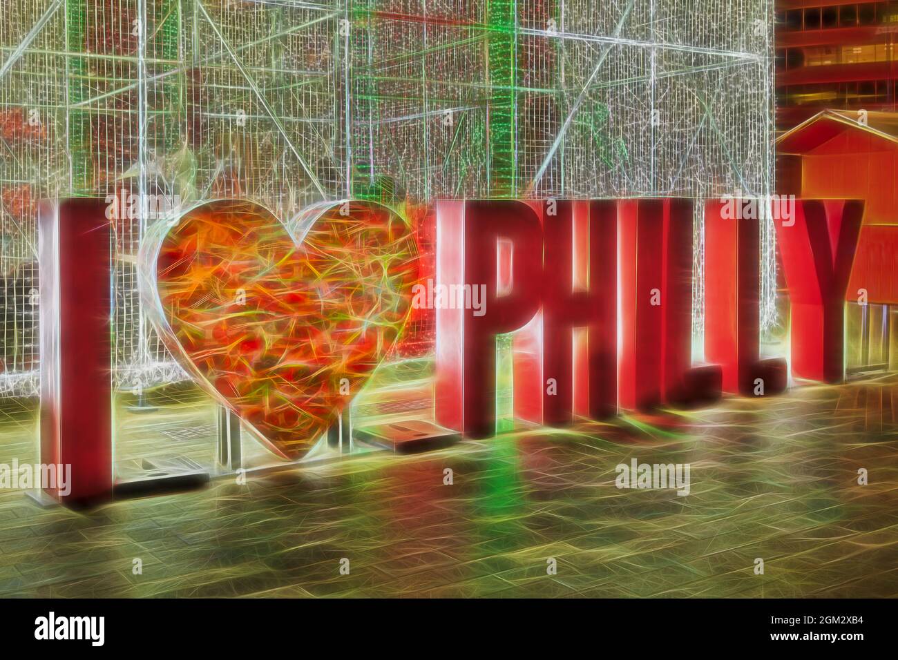 I Love Philly - illuminated I Love Philadelphia Schild mit Herz vor einer beleuchteten Installation im Hintergrund. Dieses Bild ist in Farbe als verfügbar Stockfoto
