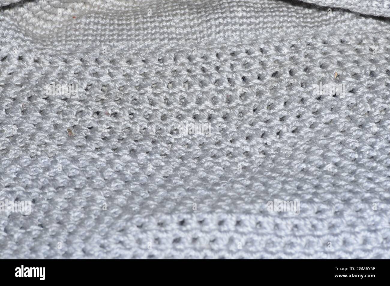 Graue Wollstruktur mit selektiver Makroaufnahme Stockfoto