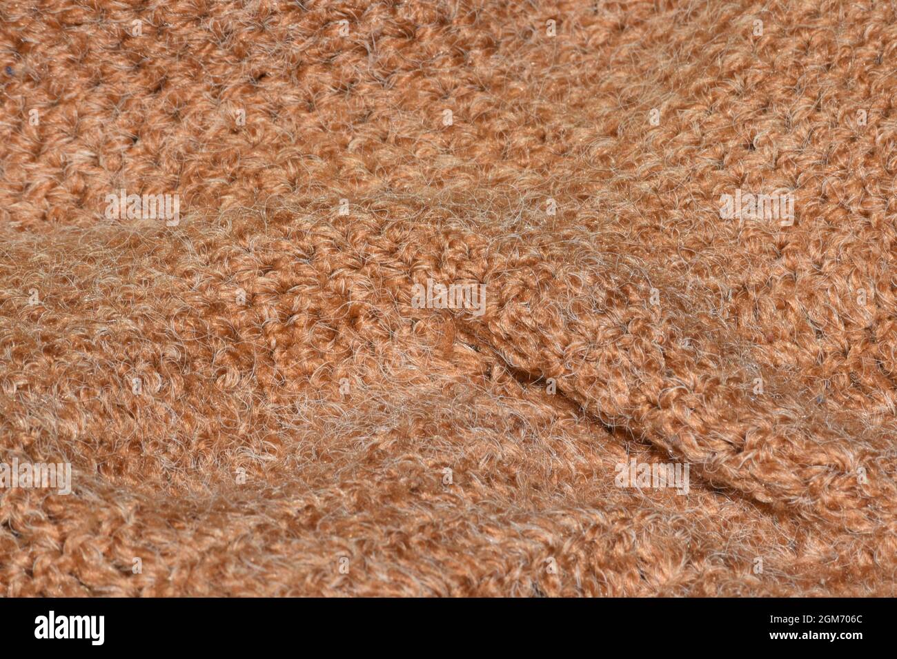 Brauner gewebter abstrakter Hintergrund mit selektivem Fokus Stockfoto