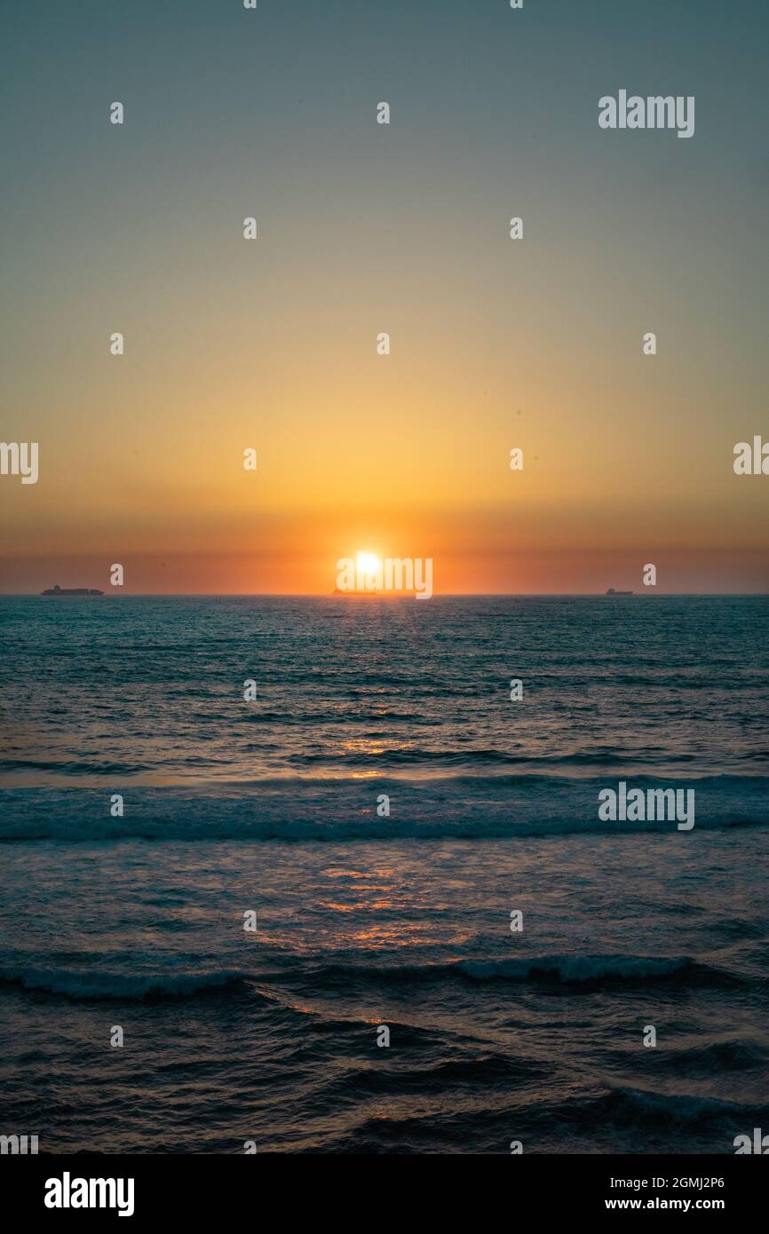 Sonnenuntergang am Strand Stockfoto