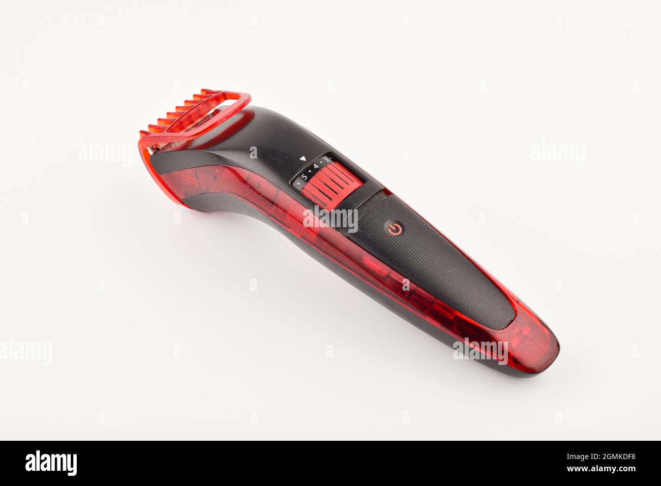 Roter und schwarzer Trimmer auf weißem Hintergrund Stockfoto
