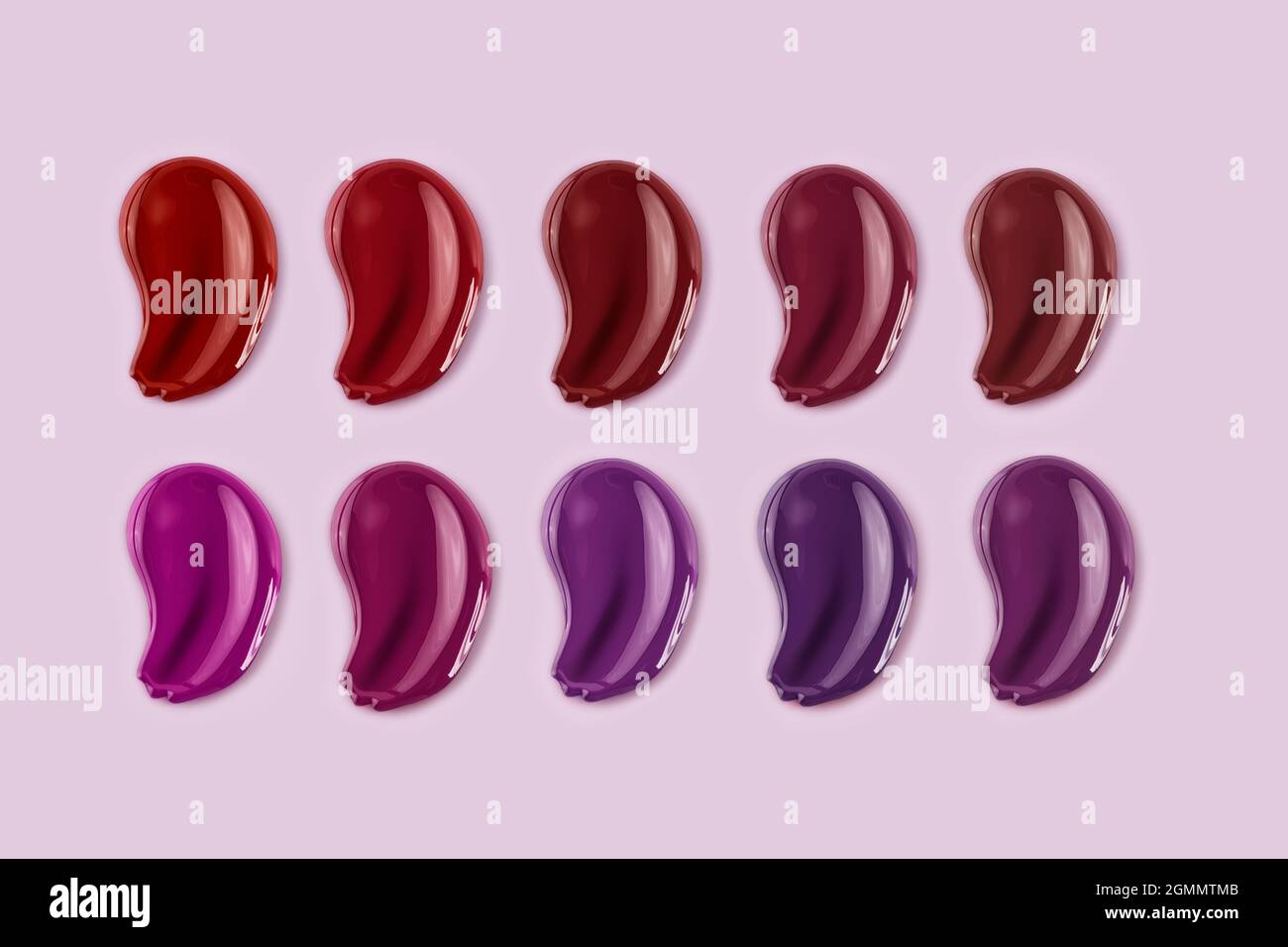 Verschiedene Lipglosses Textur isoliert auf einem rosa Hintergrund. Draufsicht. Stockfoto