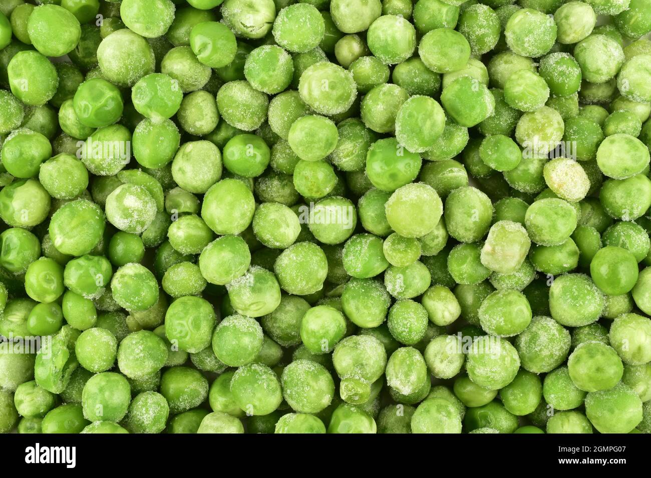 Draufsicht auf die Textur der grünen Erbsen Stockfoto