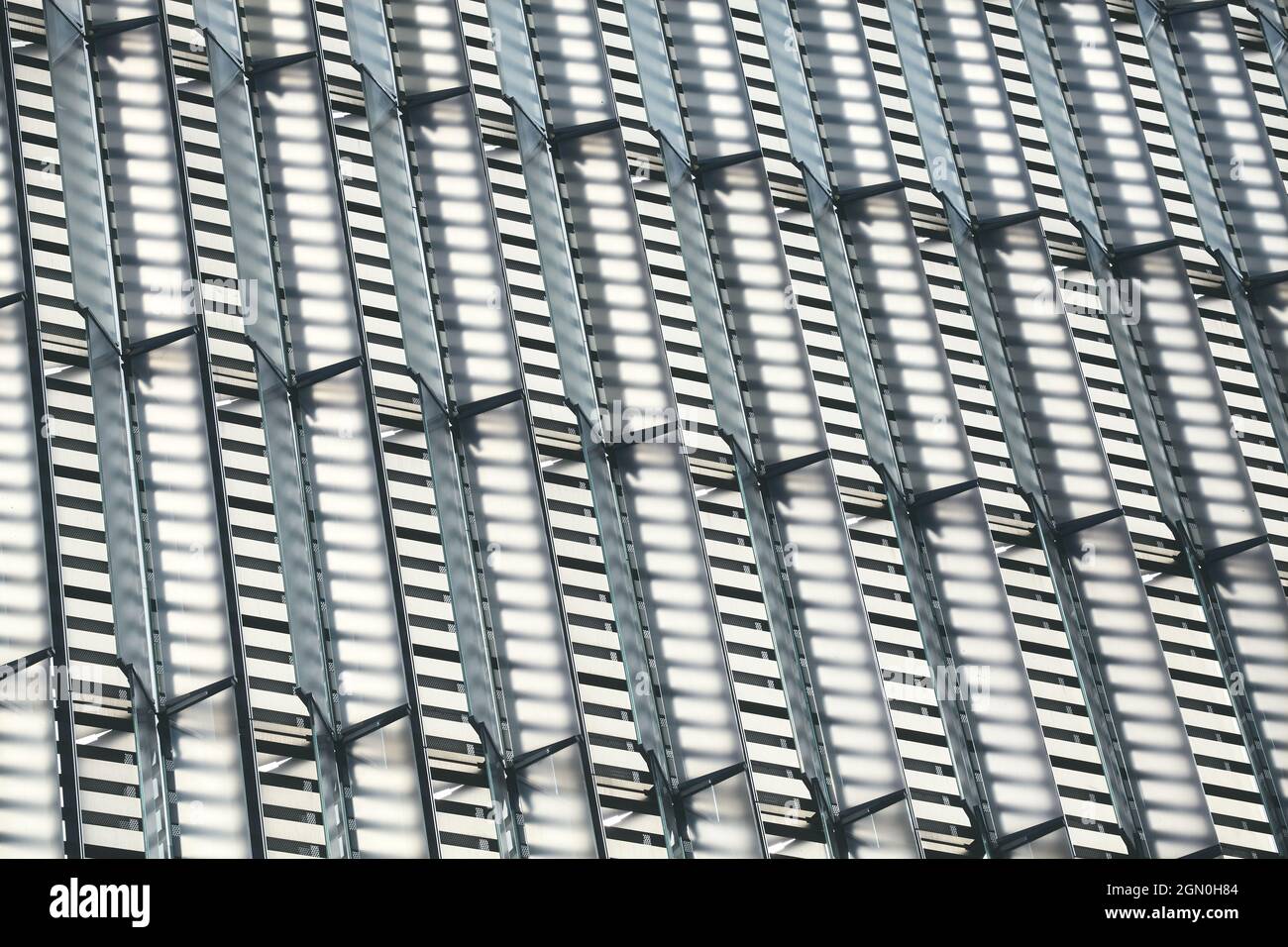 Nahaufnahme der modernen Gebäudefassade, architektonischer Hintergrund. Stockfoto