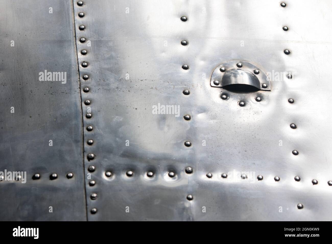 Glänzend silberner metallischer Flugzeugrumpf Stockfoto