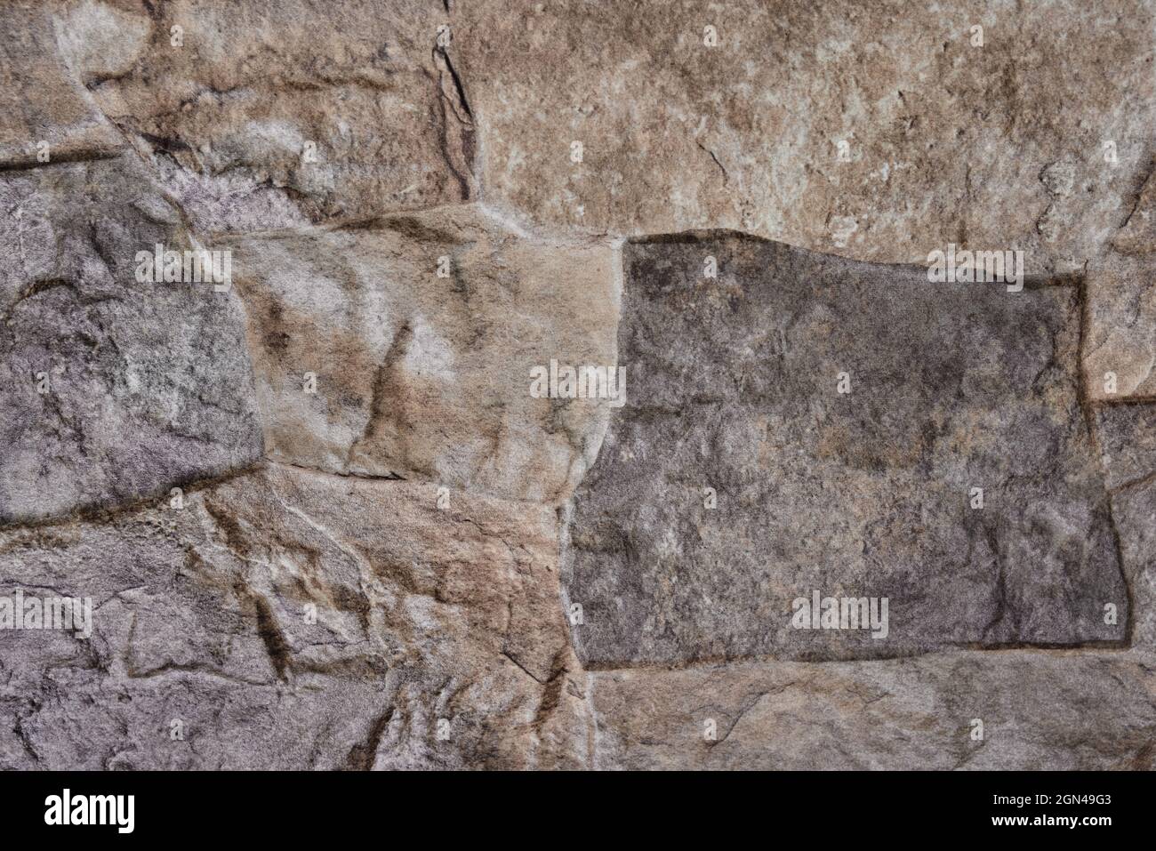 Ordentlich eingelegte Steinwand bilden eine dekorative Stockfoto