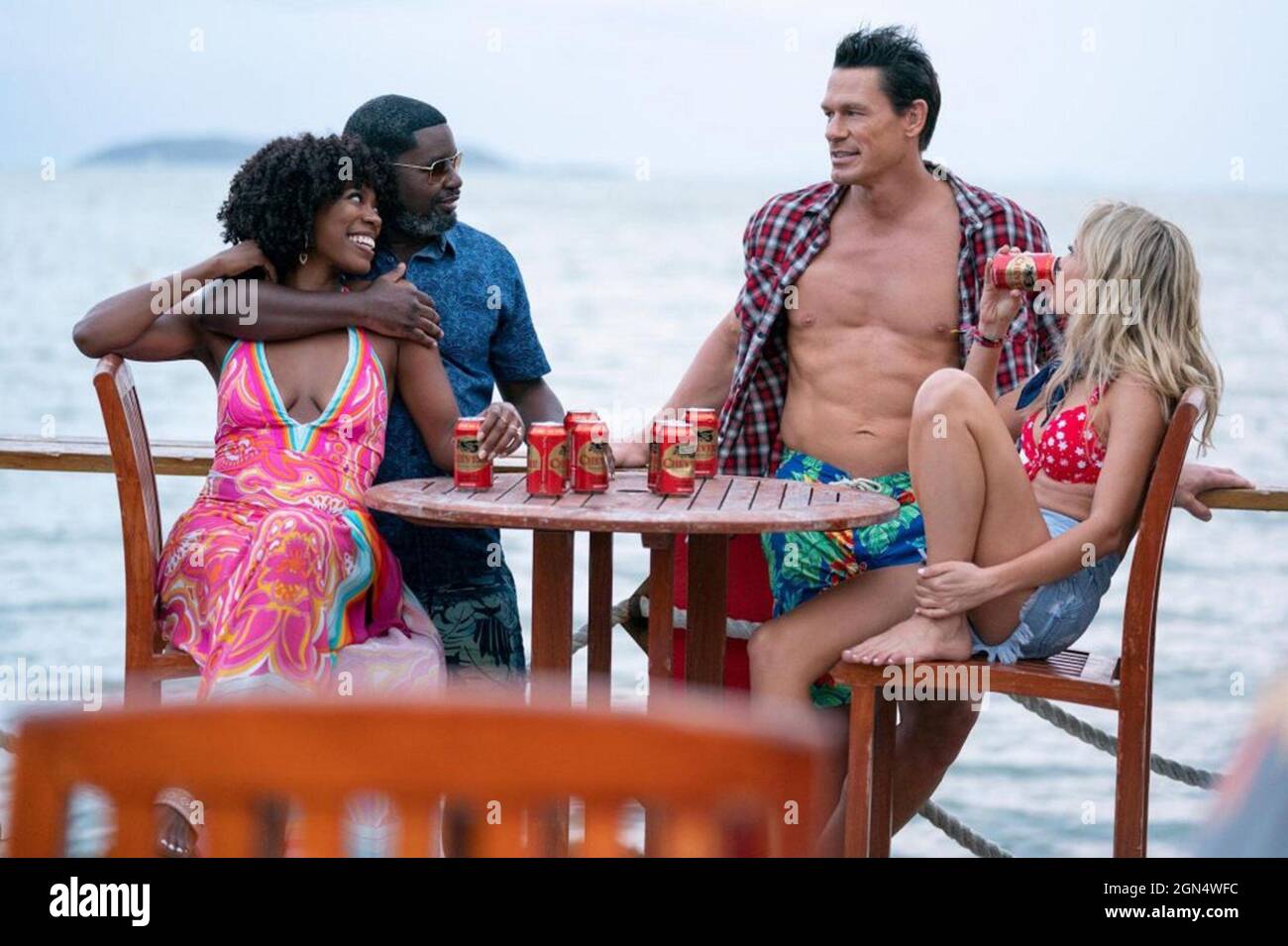 USA. John Cena, Lil Rel Howery, Meredith Hagner und Yvonne Orji in dem (C)Hulu neuen Film : Vacation Friends (2021) . Plot: Ein Paar trifft sich mit einem anderen Paar, während sie