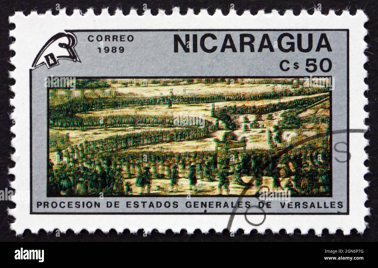 NICARAGUA - UM 1989: Eine in Nicaragua gedruckte Briefmarke zeigt die Prozession des Generalaufstandes, Versailles, Französische Revolution, Zweihundertjahrfeier, um 1989 Stockfoto