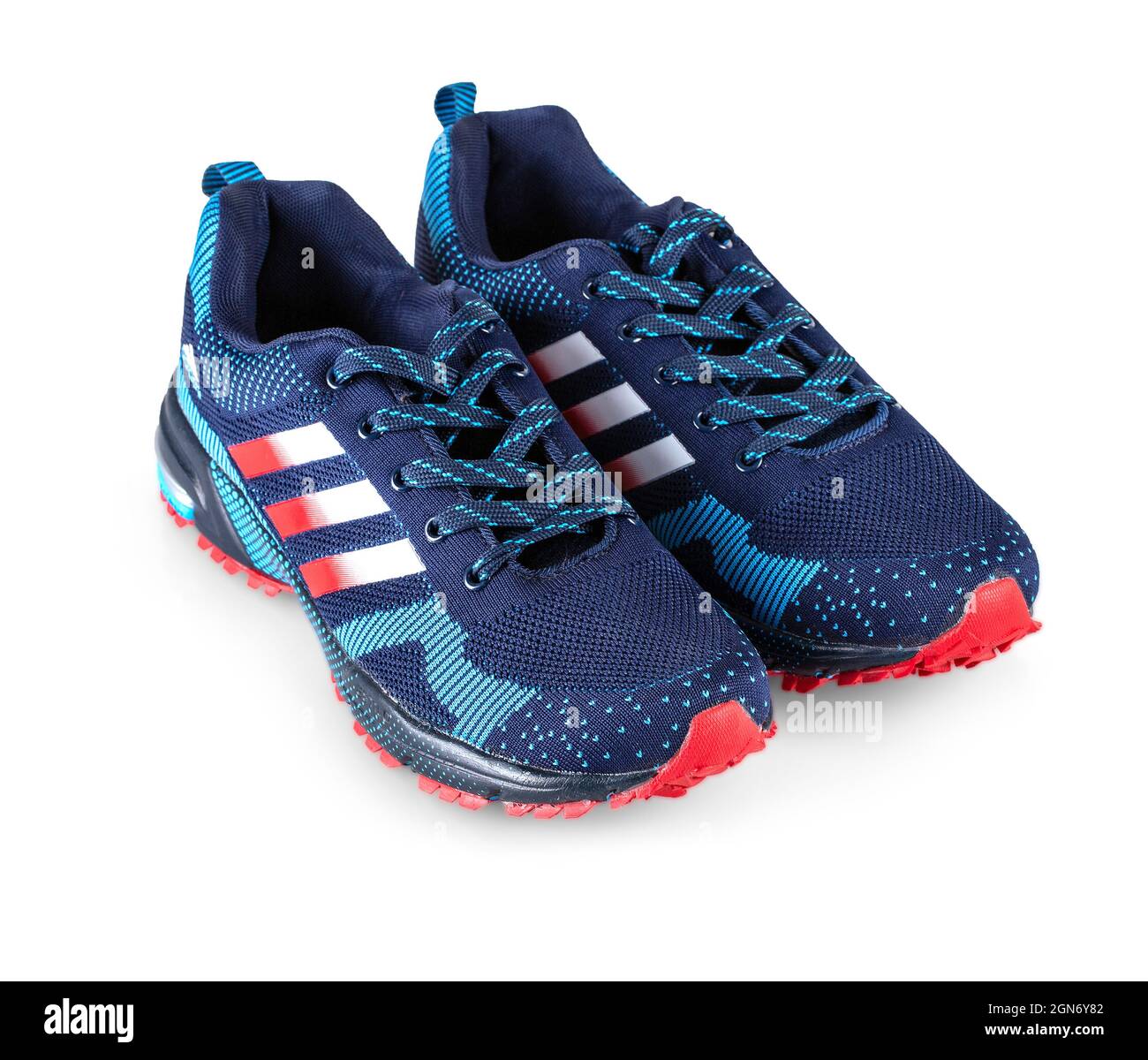 Blaue Adidas Laufschuhe. Adidas, Unternehmen in Deutschland. Isoliert auf  Weiß Stockfotografie - Alamy