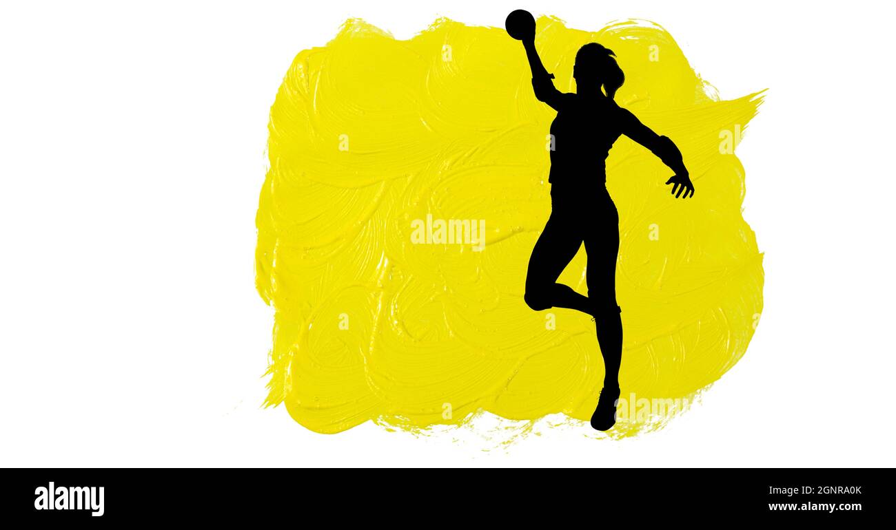 Silhouette der weiblichen Handballspielerin gegen gelbe Pinselstriche auf weißem Hintergrund Stockfoto