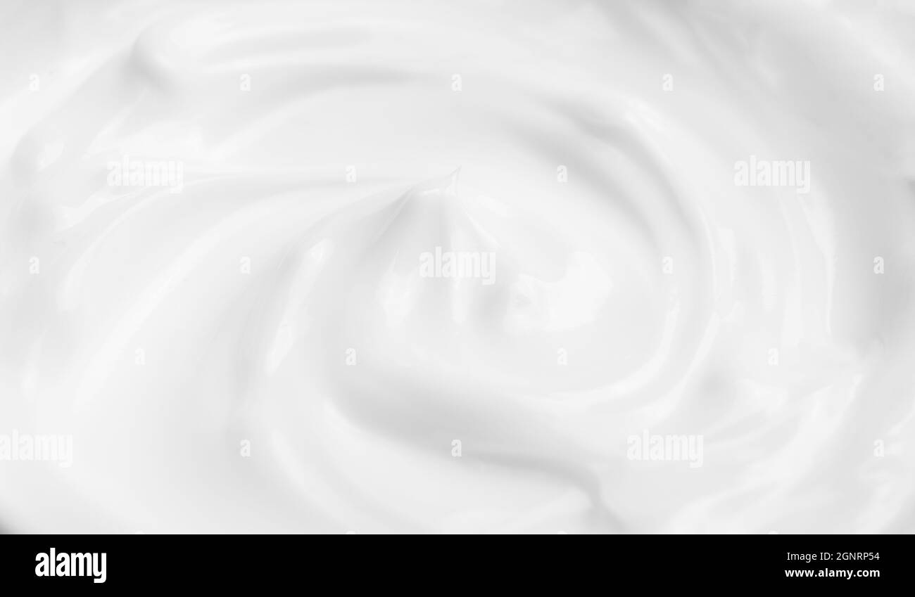 Kosmetische Creme Textur Hintergrund. Weiße Oberflächencreme für Haut und Körper in einem offenen Glas. Hochwertige Fotos Stockfoto