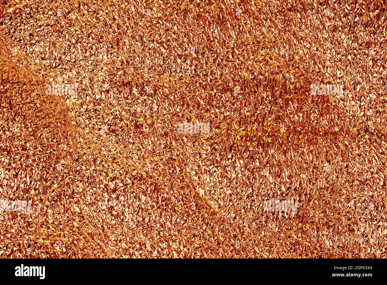 goldene zerknitterte Folienstruktur, Nahaufnahme Stockfoto