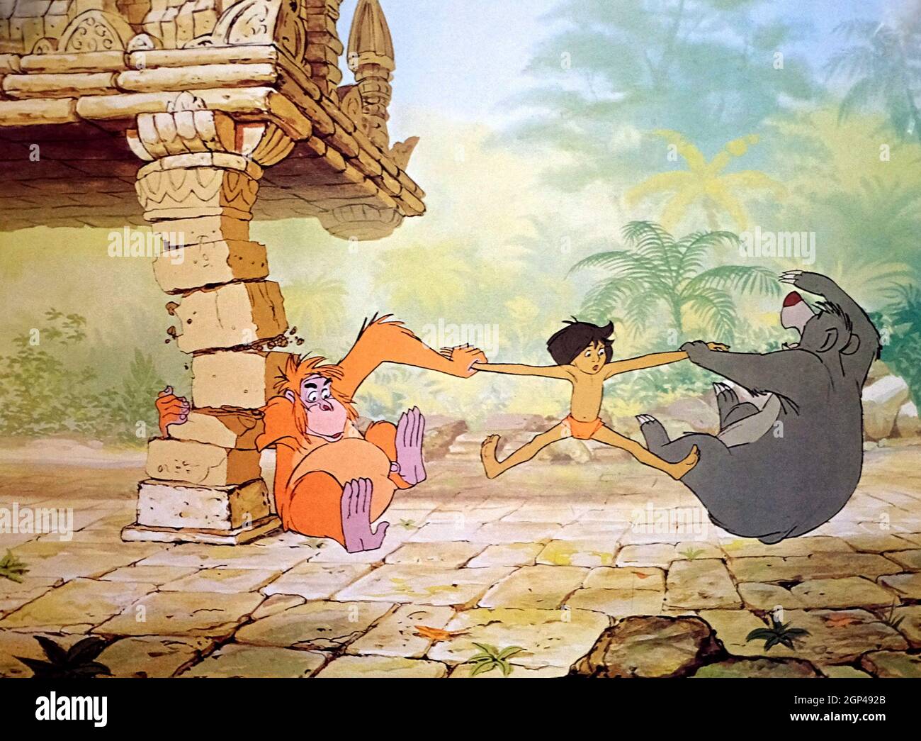 DAS DSCHUNGELBUCH, von links, König Louie der Affen (von Louis Prima), Mowgli (von Bruce