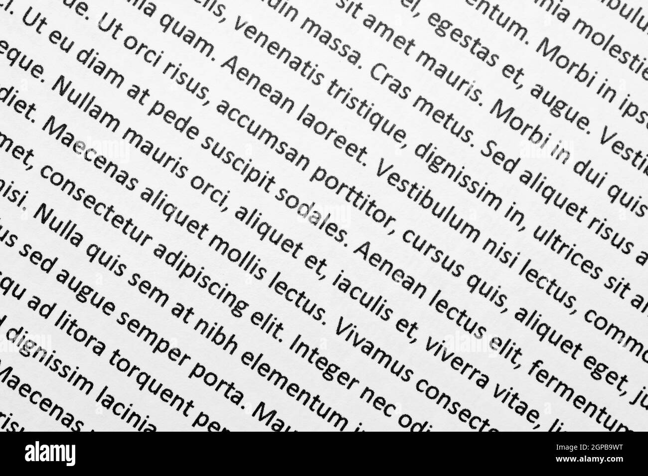 Draufsicht auf weißes Papier mit lorem ipsum-Text. Stockfoto