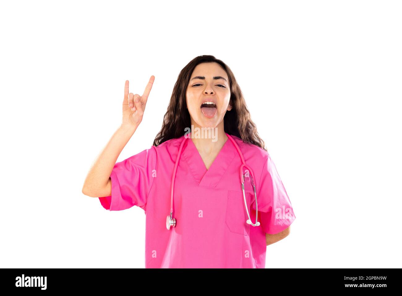 Junger Arzt mit rosa Uniform isoliert auf weißem Hintergrund Stockfoto