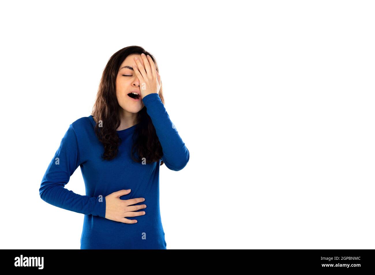 Liebenswert Teenager-Mädchen mit blauen Pullover isoliert auf einem weißen Hintergrund Stockfoto