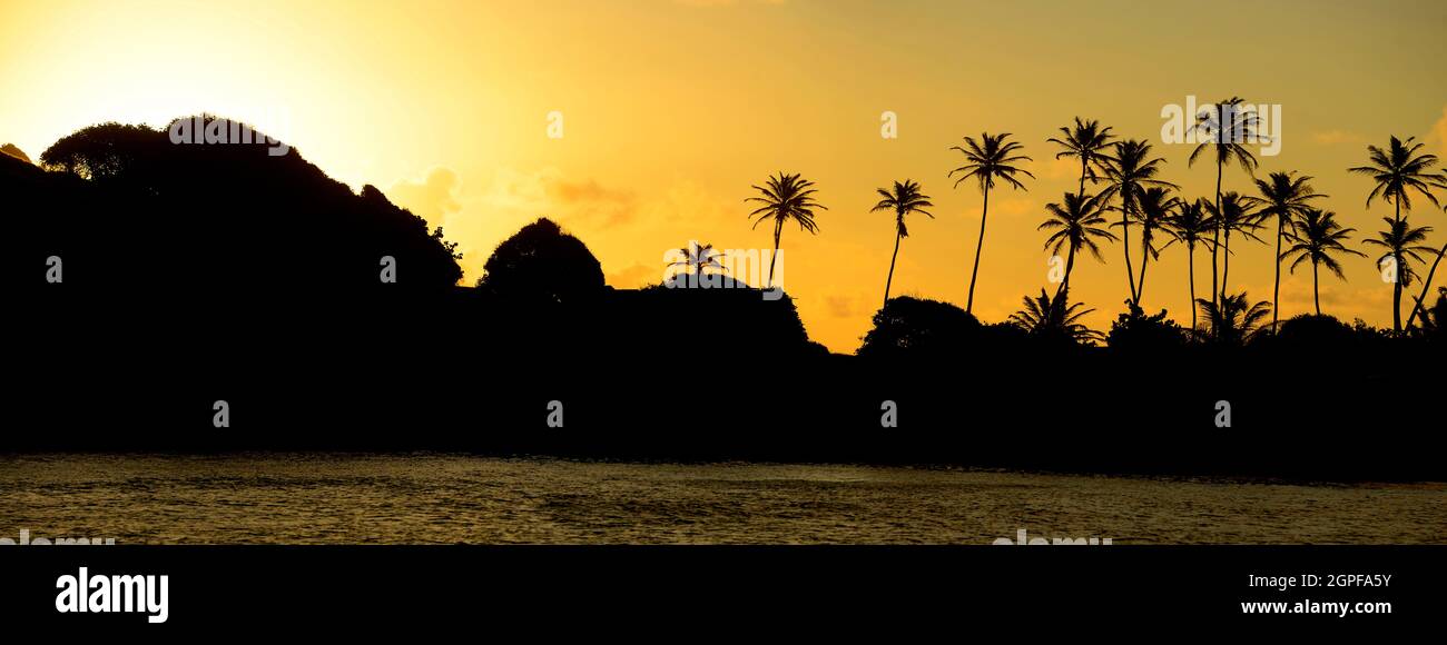 ST. VINCENT UND DIE GRENADINEN, SONNENUNTERGANG AUF DER INSEL MAYREAU Stockfoto