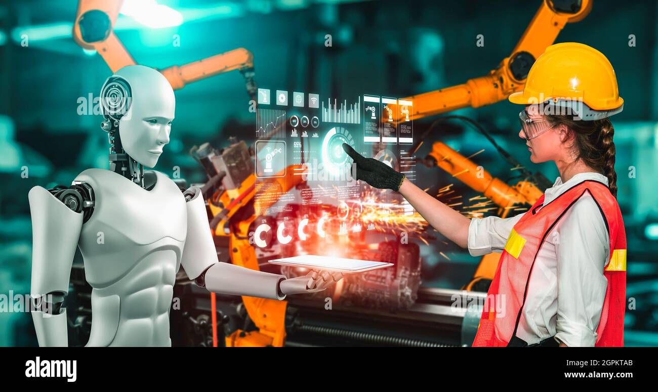 Mechanisierter Industrieroboter und menschlicher Arbeiter arbeiten in der zukünftigen Fabrik zusammen. Konzept der künstlichen Intelligenz für industrielle Revolution und Stockfoto