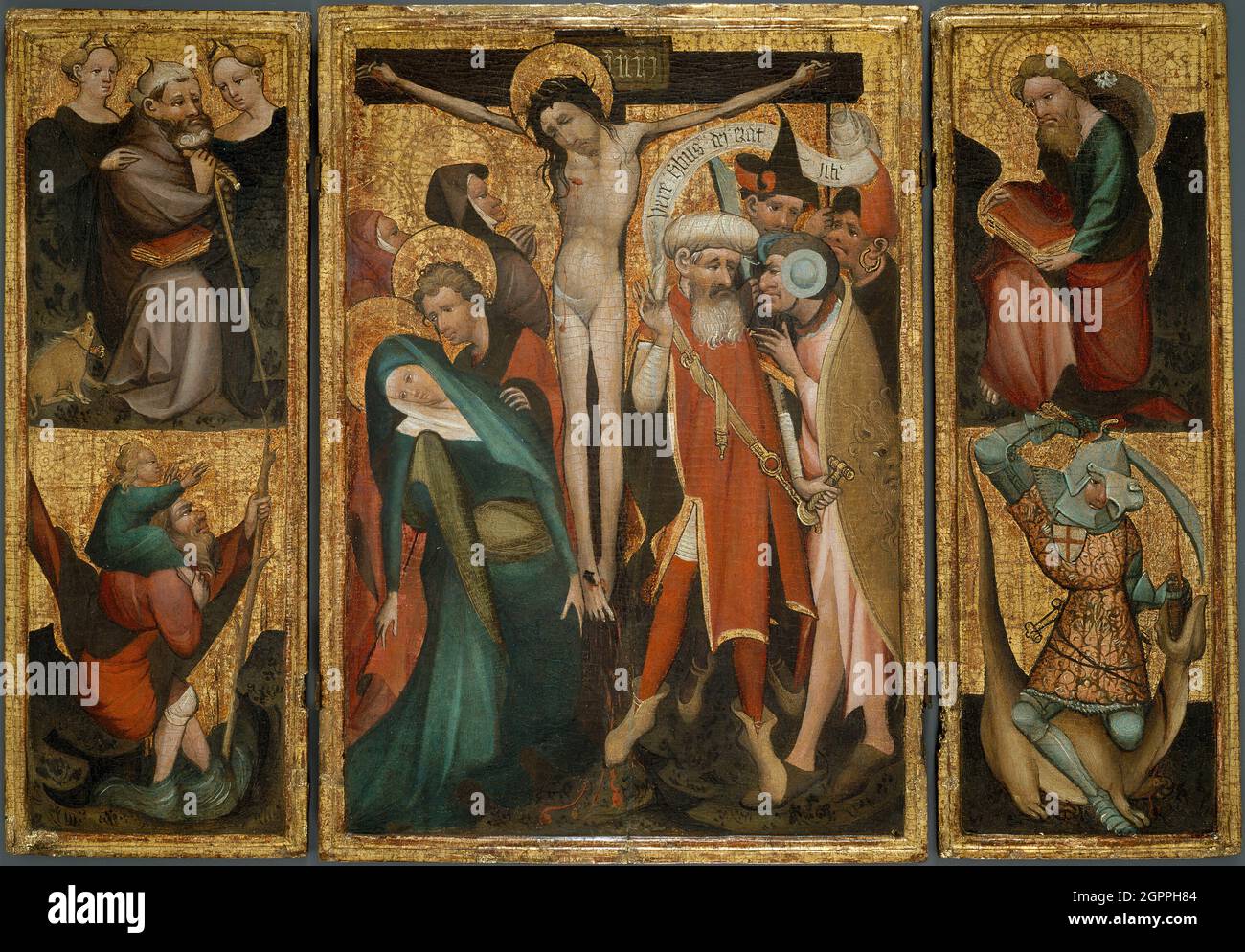 Triptychon der Kreuzigung mit den Heiligen Antonius, Christopher, James und George, um 1400. Stockfoto