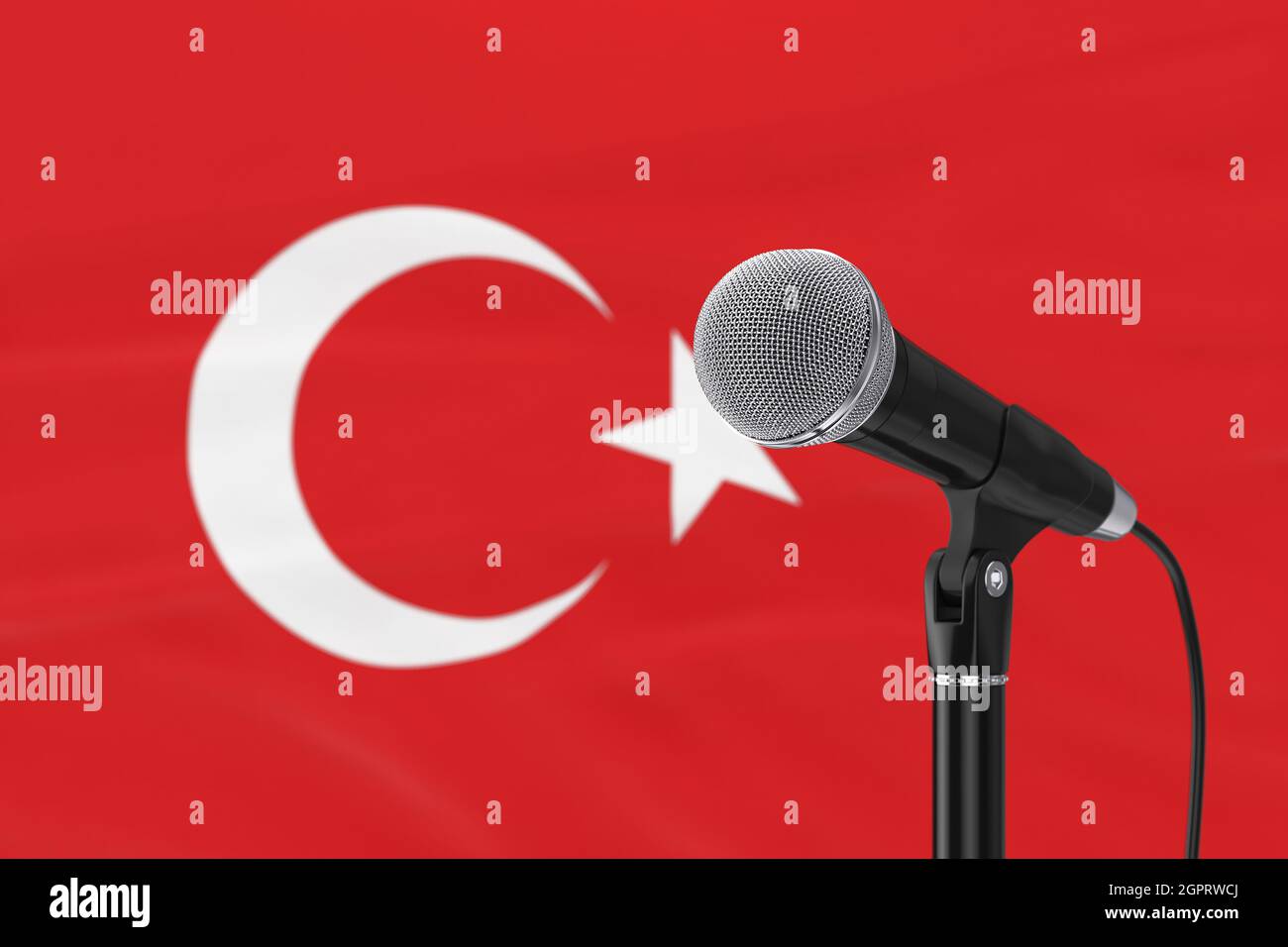 Sprechmikrofon stehen gegen die verschwommene türkische Flagge extreme Nahaufnahme. 3d-Rendering Stockfoto