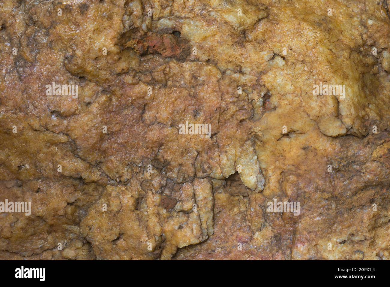 Felsenoberfläche, Hintergrundstruktur, Nahaufnahme, natürliche abstrakte oder fotografische Kulisse Stockfoto