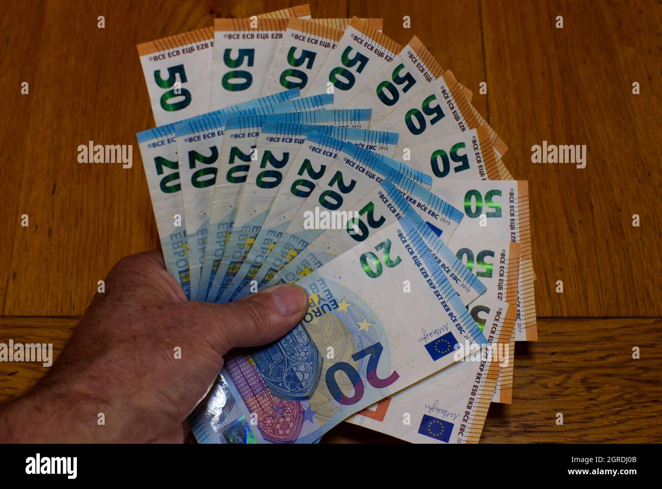 Mehr Geld bitte Stockfoto
