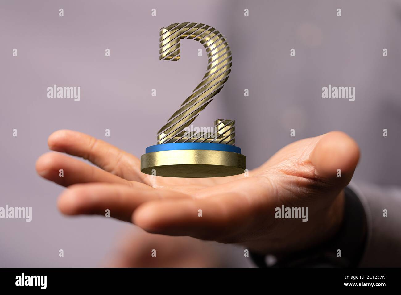 3D-Rendering der Nummer 2 schwebend auf menschlichen Händen – Konzept für den 2. Platz Stockfoto