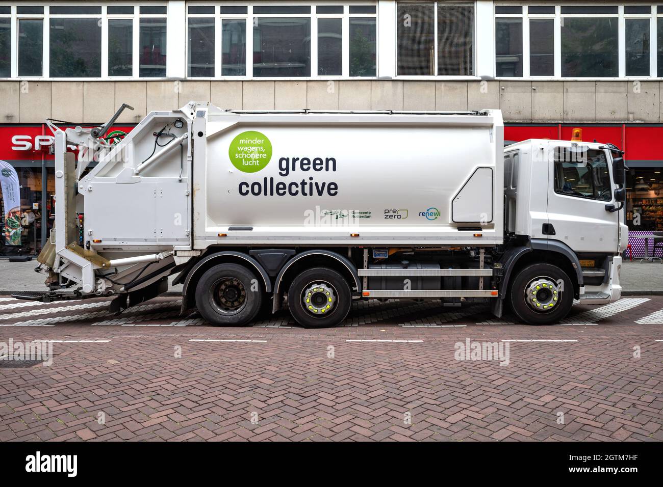 Green Collective Müllwagen Stockfoto