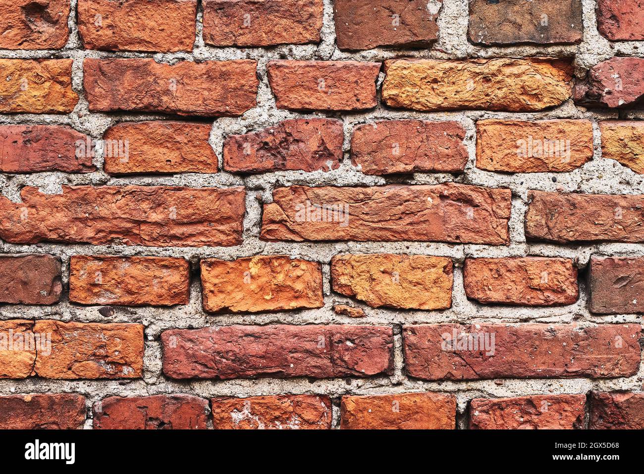 Alte rote Backsteinmauer, grunge Hintergrund. Platz für Text kopieren. Stockfoto