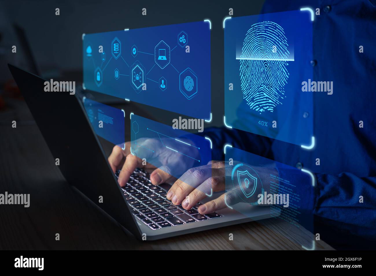 Fingerabdruck-Scan für sicheren Zugriff auf geschützte Datennetzwerke mit Biometrie. Person, die Fingerabdruck-Authentifizierungstechnologie auf einem Laptop-Computer verwendet Stockfoto