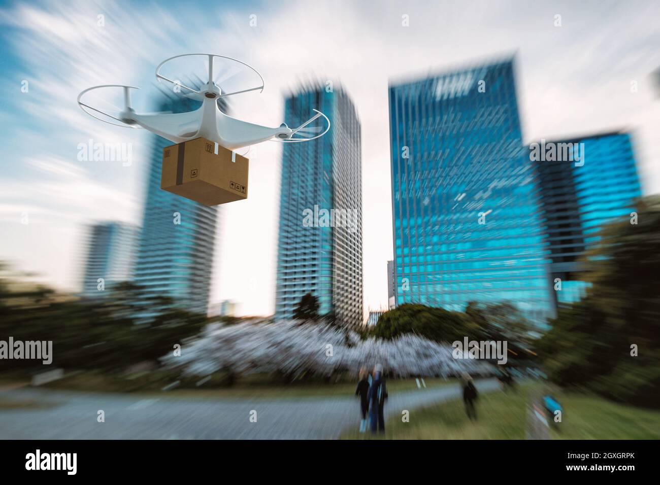 Lieferung eines Pakets per Luft mit Quadcopter Stockfoto