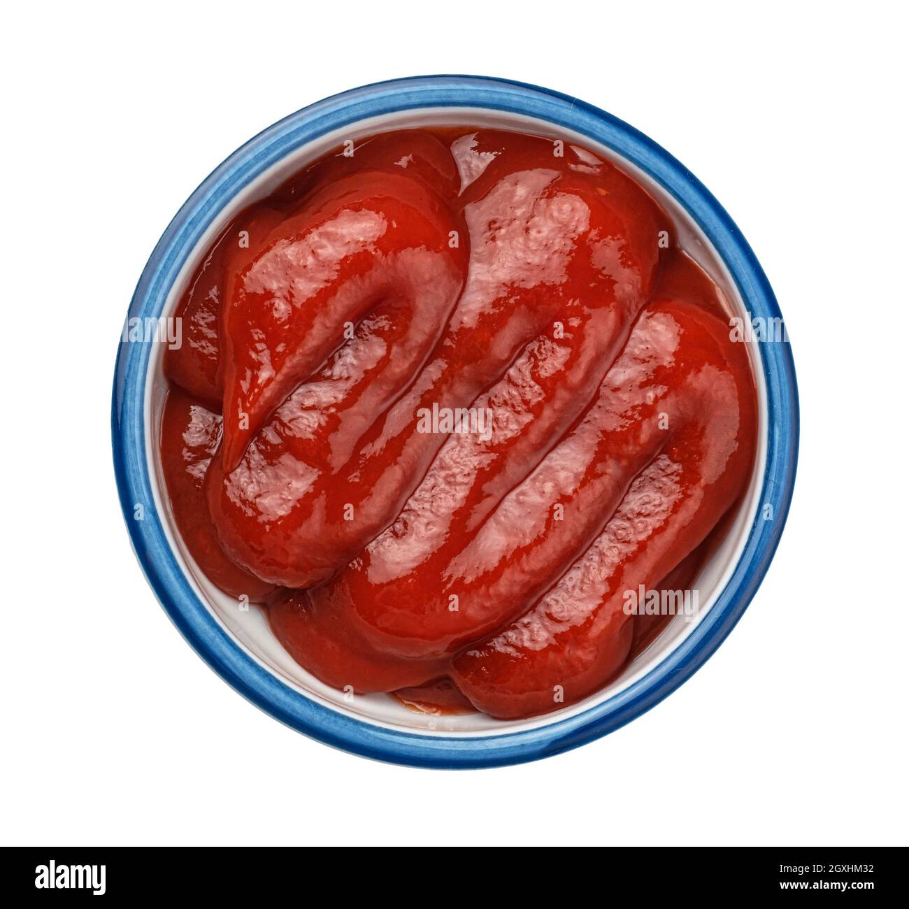 Draufsicht auf Ketchup-Sauce isoliert auf weißem Hintergrund Stockfoto