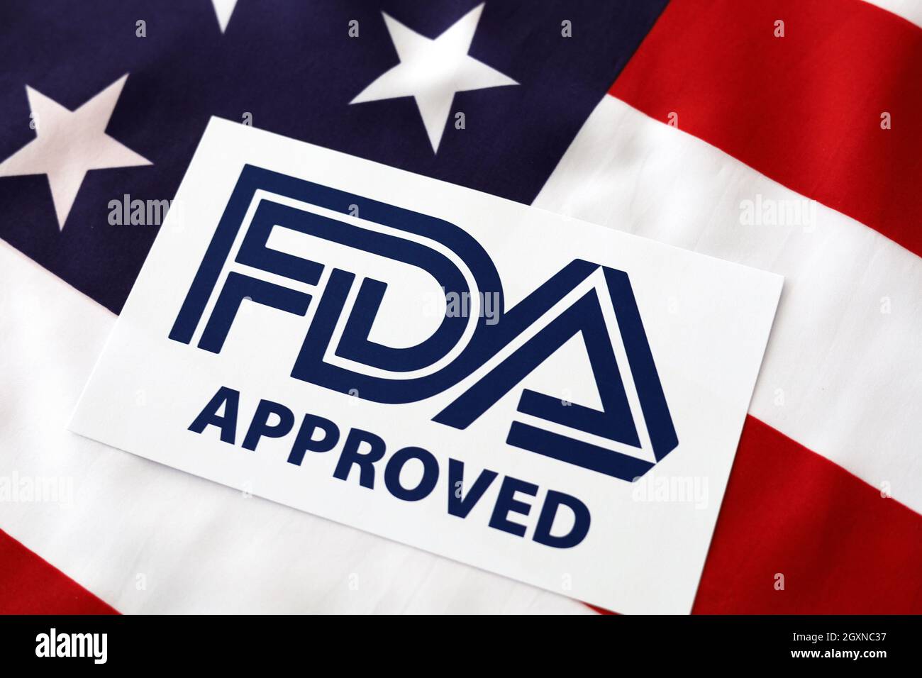 Logo FDA-zugelassen mit der Flagge der Vereinigten Staaten von Amerika Stockfoto