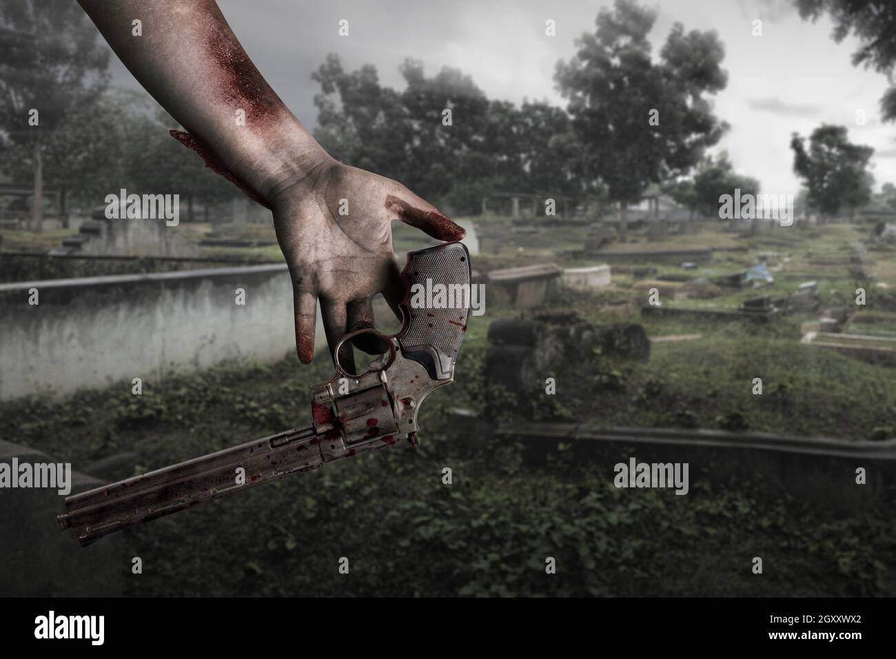 Zombie Hände mit Wunde lassen die Waffe auf den Friedhof fallen Stockfoto