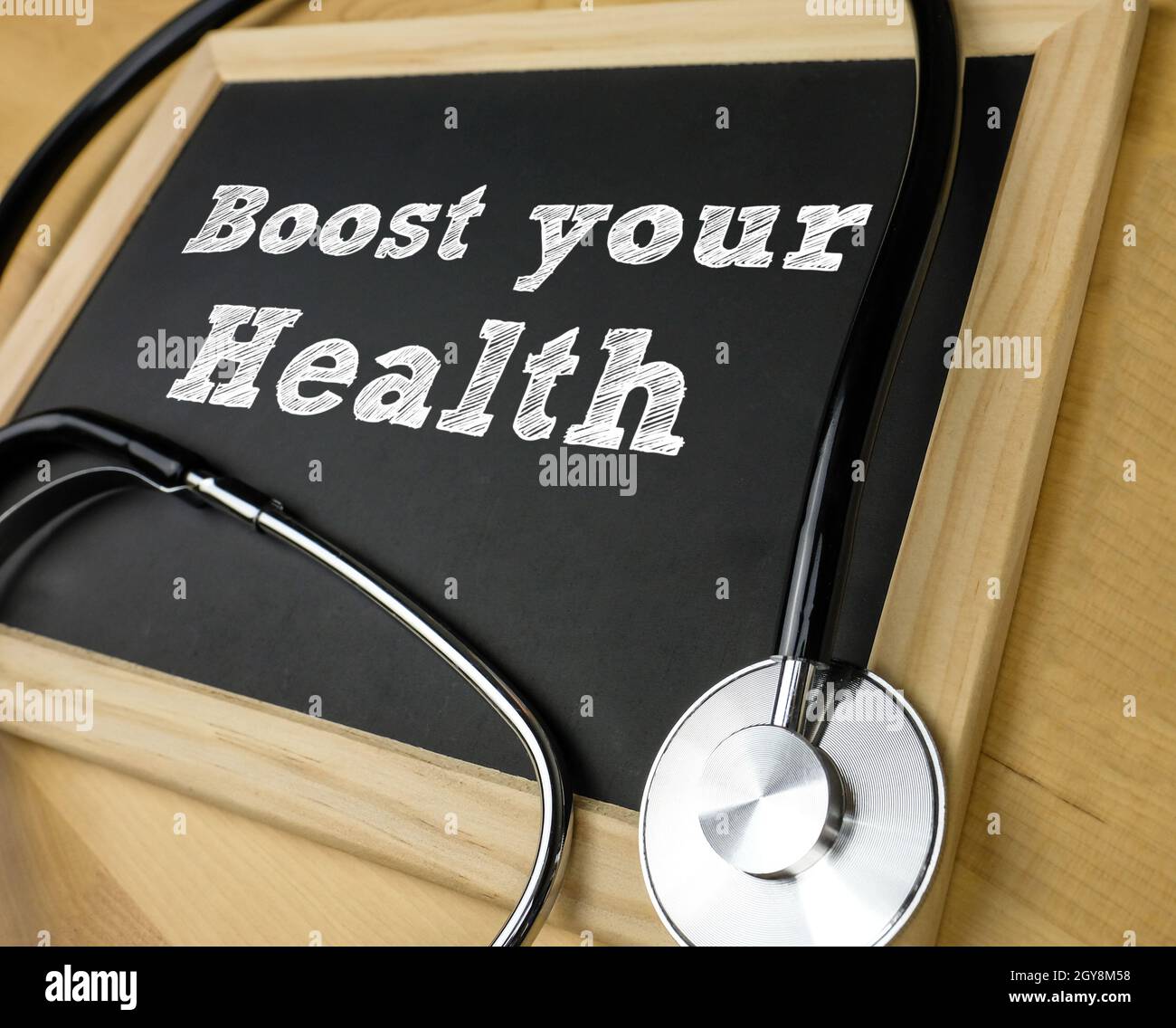 Steigern Sie Ihre Gesundheit - Nachricht auf dem Schwarzen Brett Stockfoto