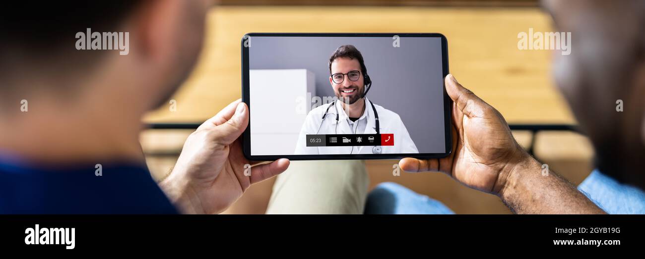Medizinischer Doktor Video-Konferenzgespräch Auf Tablet-Computer Stockfoto
