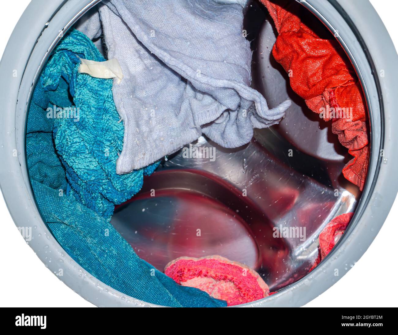 Rotierende Trommel in einer Waschmaschine Wanne mit Kleidung.  Unterlegscheibe. Automatische Wäsche. Service und Reparatur von Geräten.  Spritzwasser. Reparaturwerkstatt. Stainle Stockfotografie - Alamy