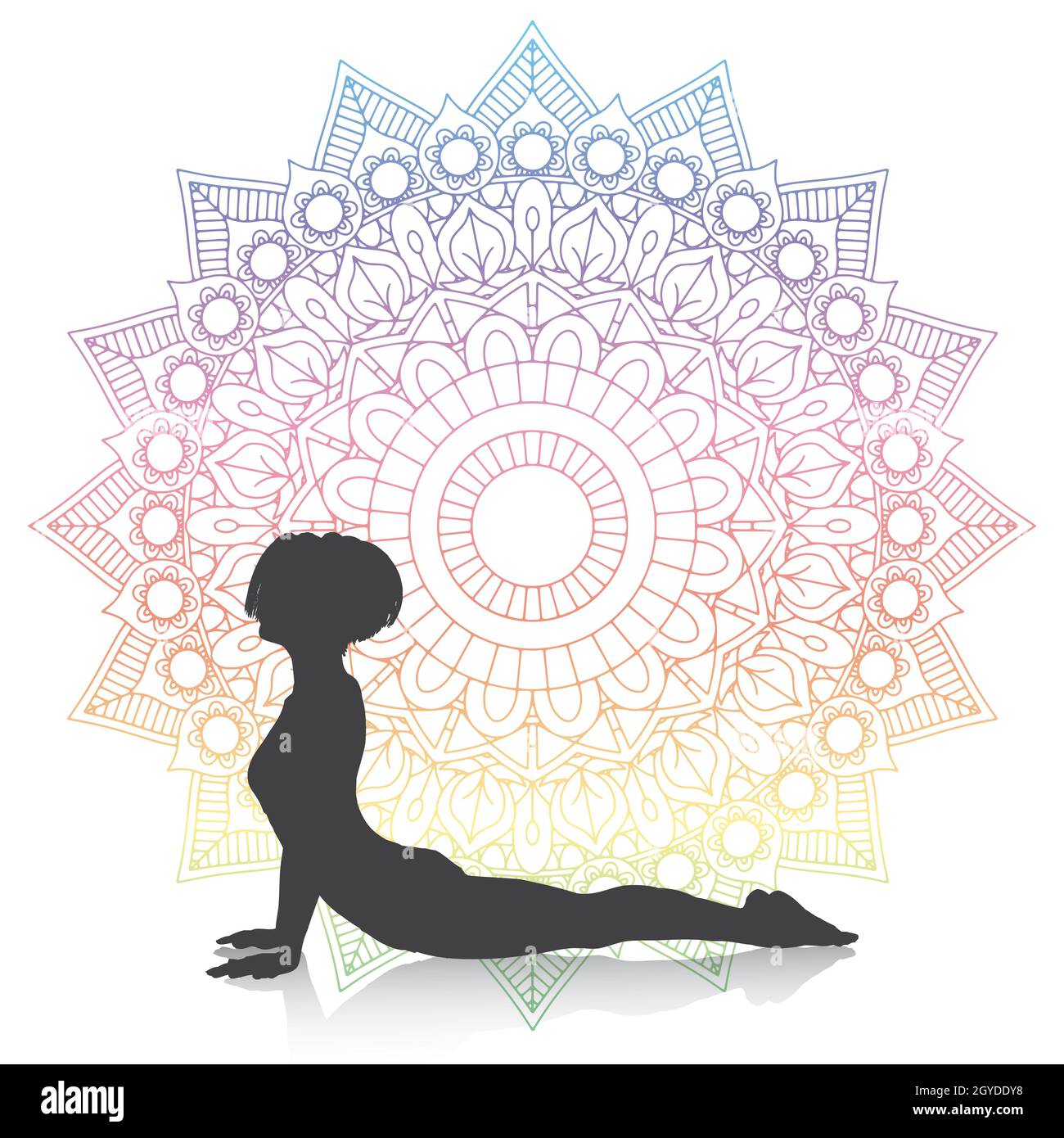Silhouette einer Frau in Yoga-Kobra auf einem Mandala-Design Stockfoto