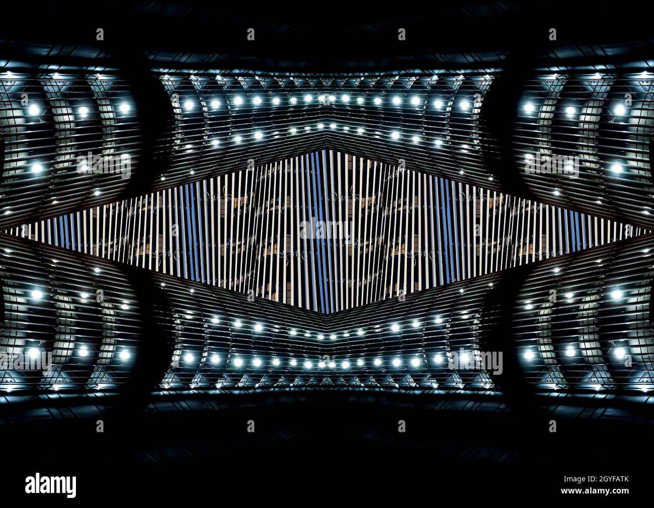 Abstraktes geometrisches Bild einer Gebäude-Nachtbeleuchtung. Nachtbeleuchtung. Bürogebäude. UFO. Raumschiff. Fremde Zivilisation. Hintergrundbild. Temp Stockfoto